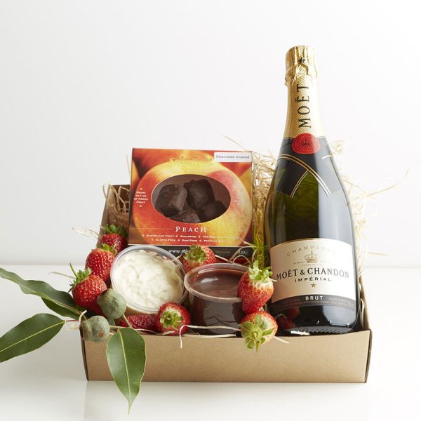 The How Sweet it is hamper contains: 1 bottle of Moet Champagne 750ml, Fresh Strawberries, Chocolate Dipping Sauce, Whipped Cream and Chocolate Solarfruit.