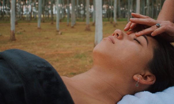 Image 7: A lady getting a massage on the front deck of the chalet.